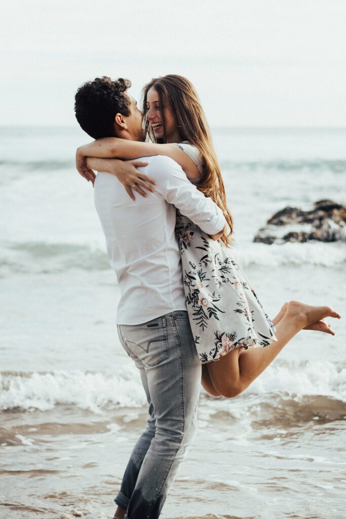 Happy couple embracing after online couples counselling